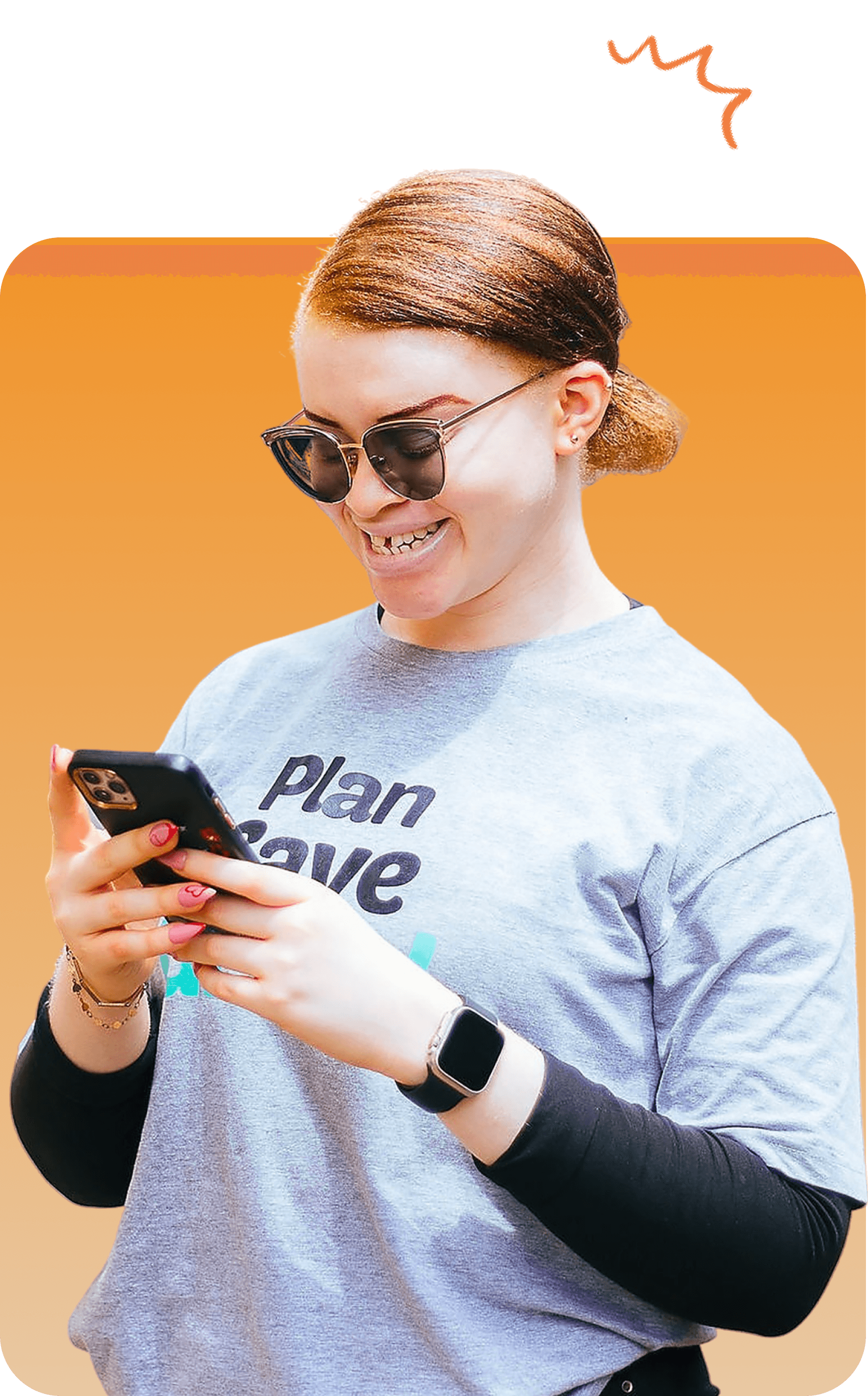 A person smiling while using the Nkwa app on their phone